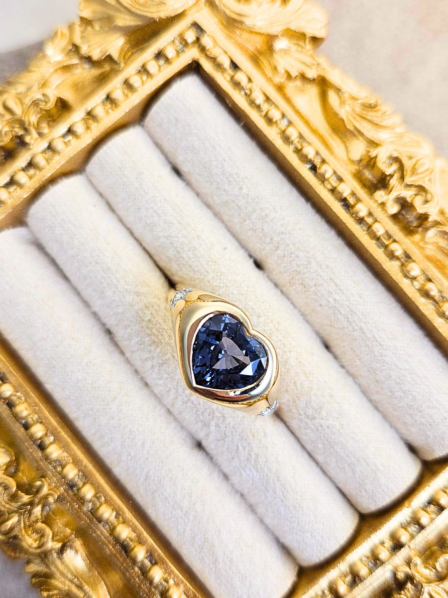 Bespoke cobalt blue spinel heart-cut ring in gold, crafted by Safir